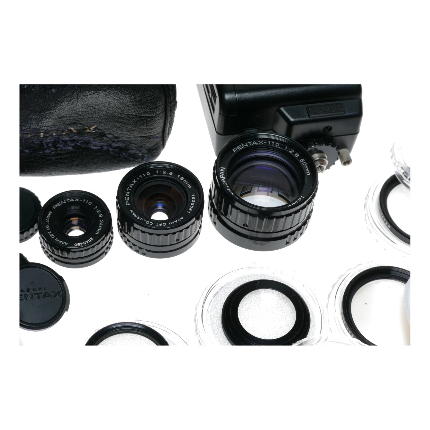 Pentax Auto 110 Film Camera Lenses 2.8/50 28mm 14mm Filters Flash Case